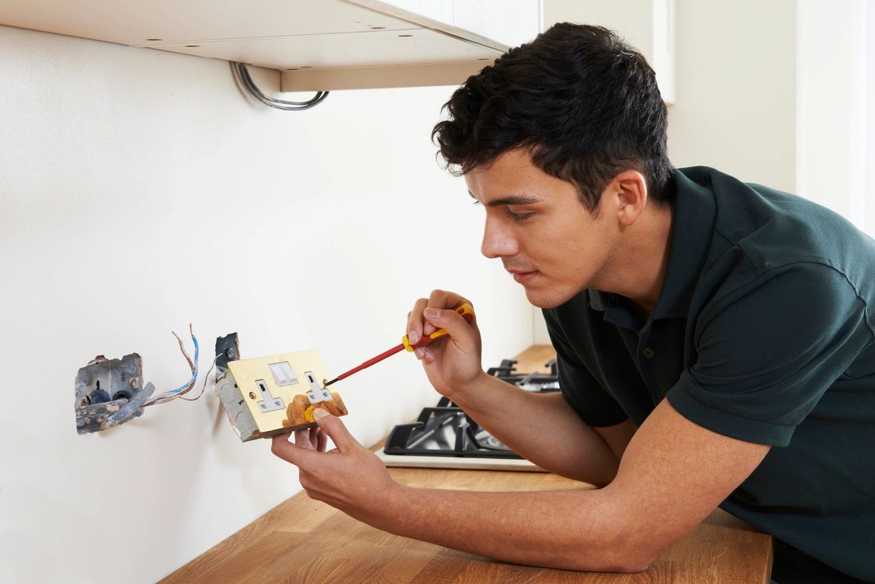 An electrician preforming services in Calgary