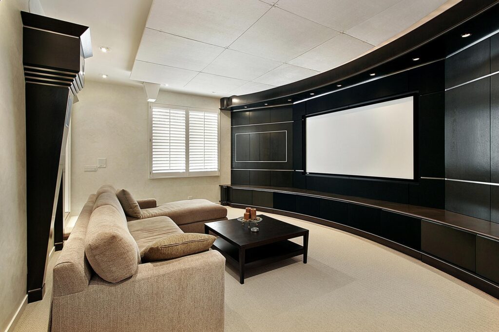 Living room with beige sofa, black center table and TV